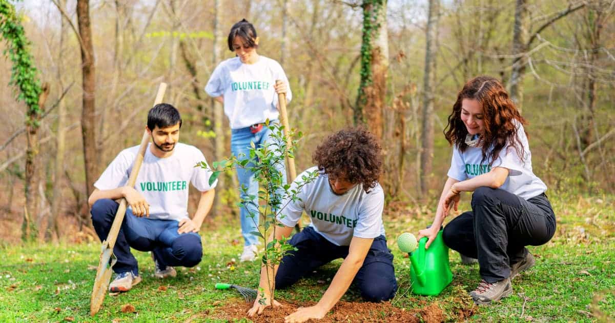 Group of students volunteering in a community project.