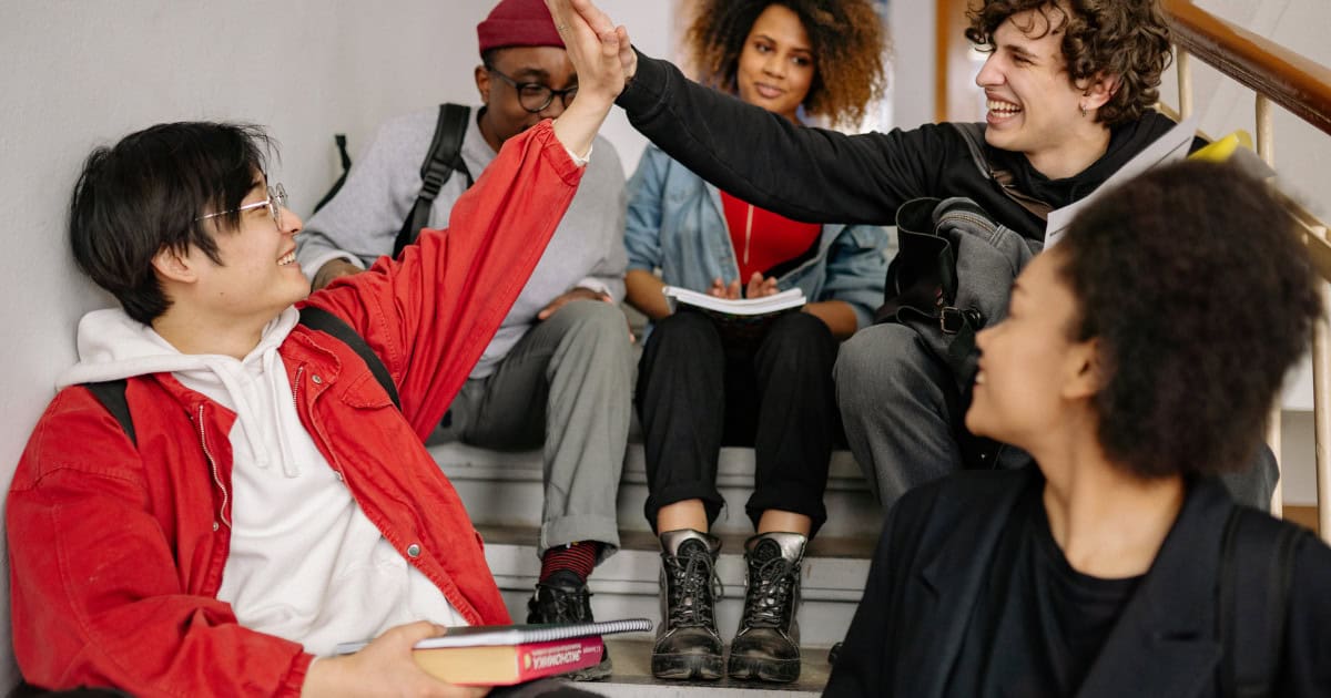 Group of students celebrating for the their achievements in getting 6.0 GPA Score.