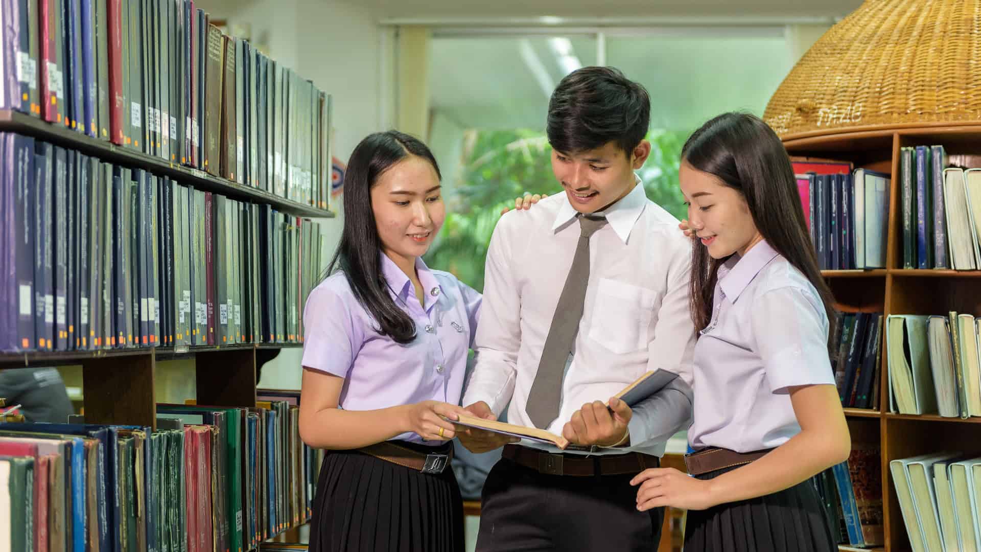 student leader helping his peers with studies