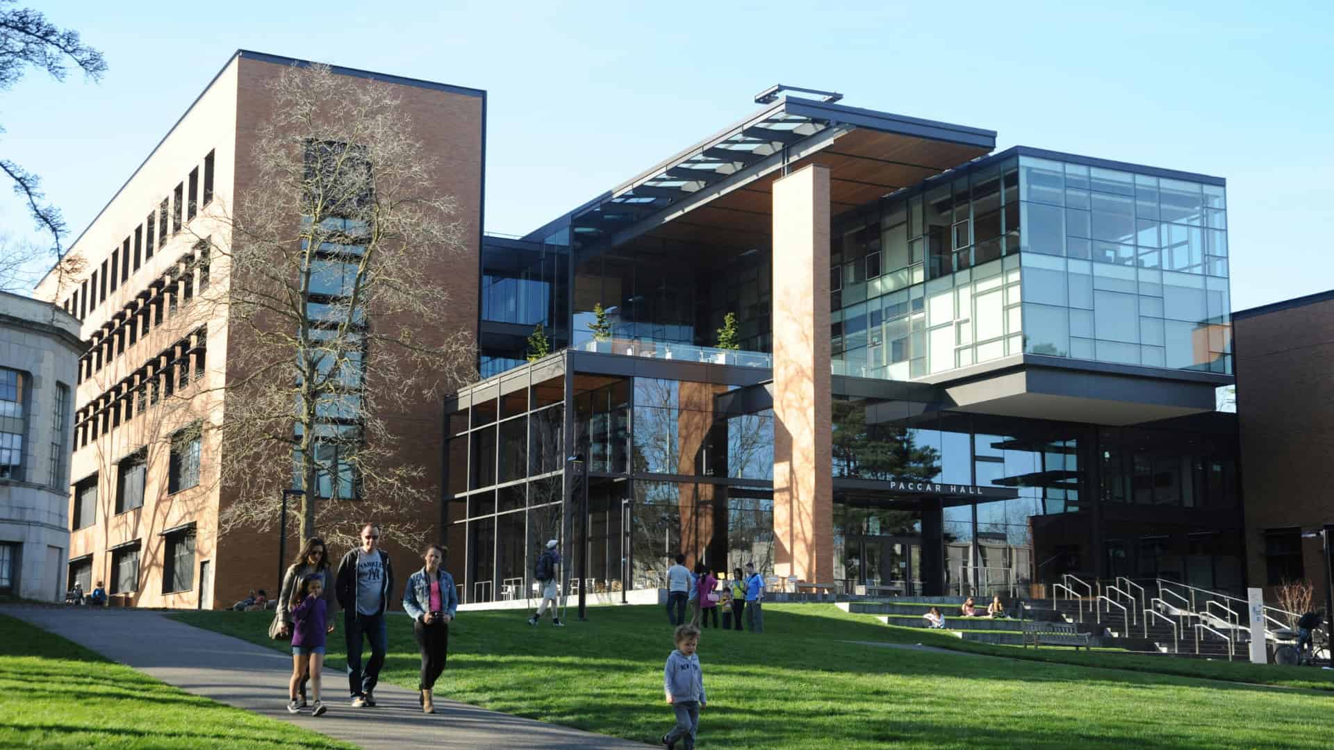 a family visiting a college campus while choosing a college