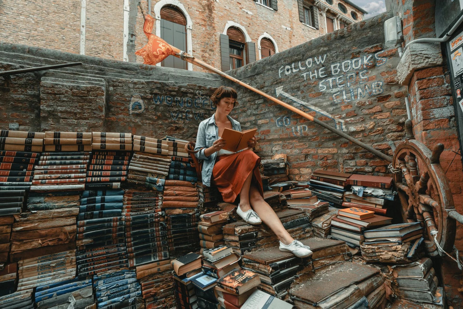 A student reading textbooks