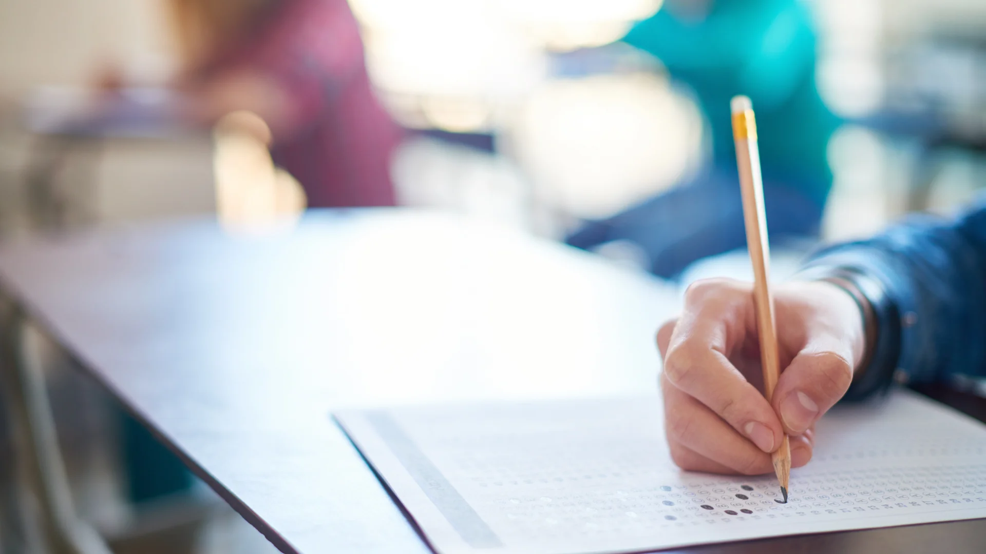 student deciding between taking sat or act exam