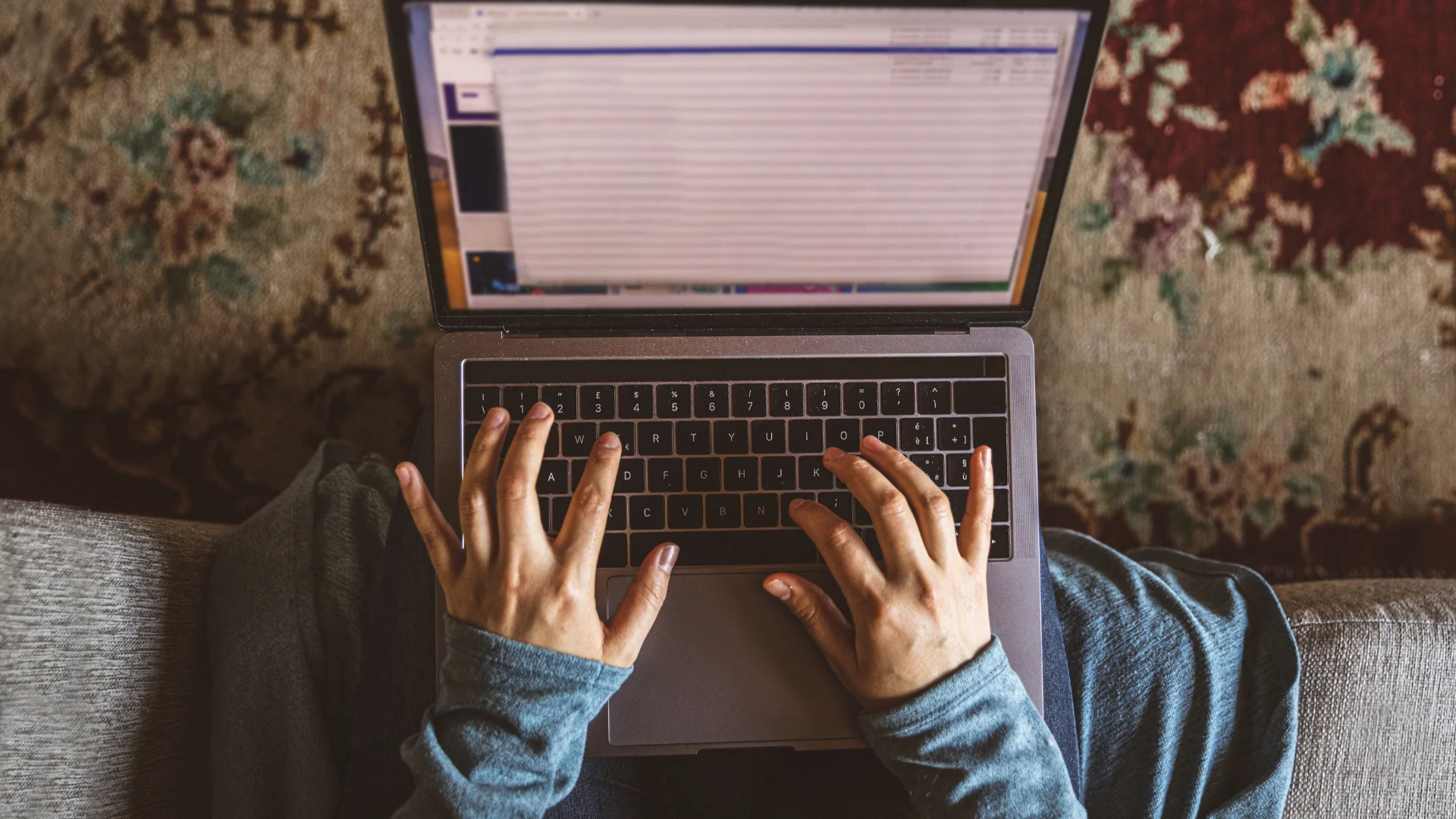 student writing an email to a college counselor