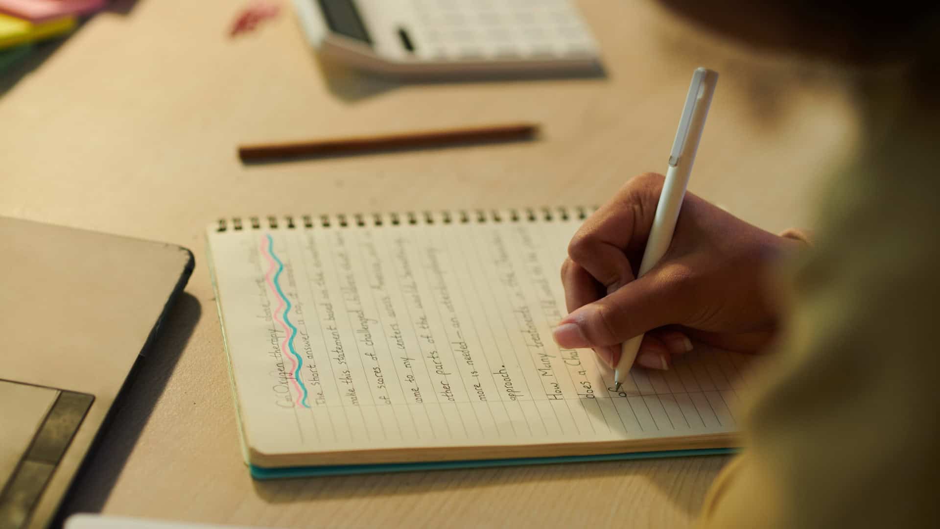 student working on her college essay and adding humorous personal anecdotes