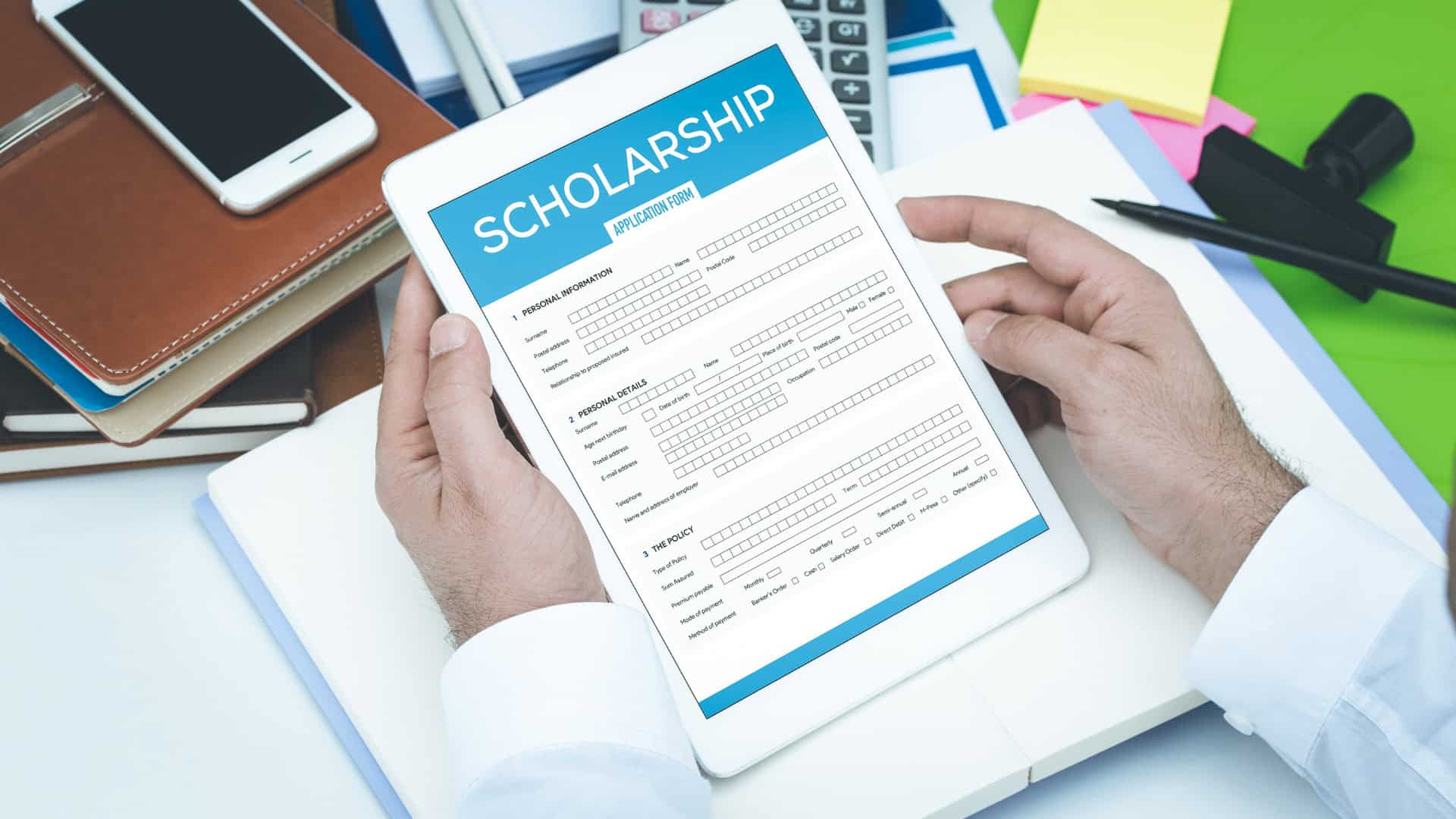 students filling out multiple college scholarship forms